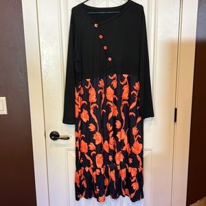 NWOT Black and orange floral dress. Buttons from the angled neck down to waist.